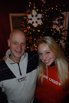 Uncle Chuck and I enjoying time by the tree in 2008.