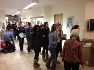 St. Mary's Academy, preparing for gift basket delivery.